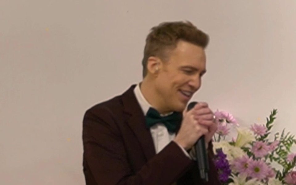 Justin S. Grant singing at a Christmas concert
